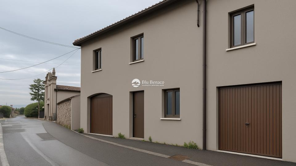 Muscoline, villetta a schiera con box auto e giardino 
