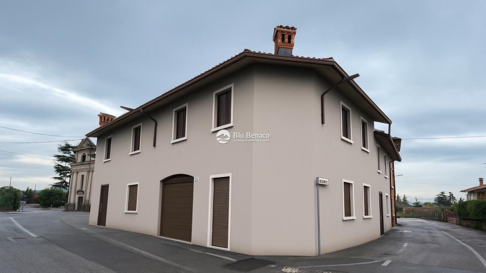 Muscoline, villetta a schiera con box auto e giardino 