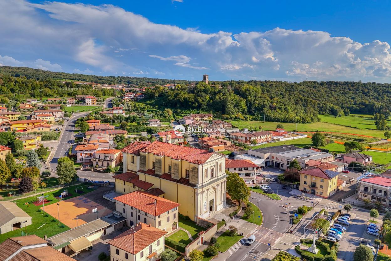 Muscoline, villetta a schiera con box auto e giardino 
