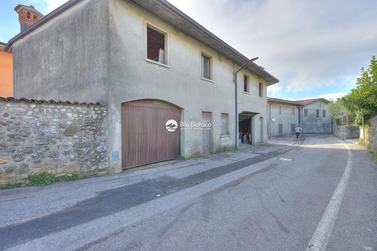 Muscoline, villetta a schiera con box auto e giardino 
