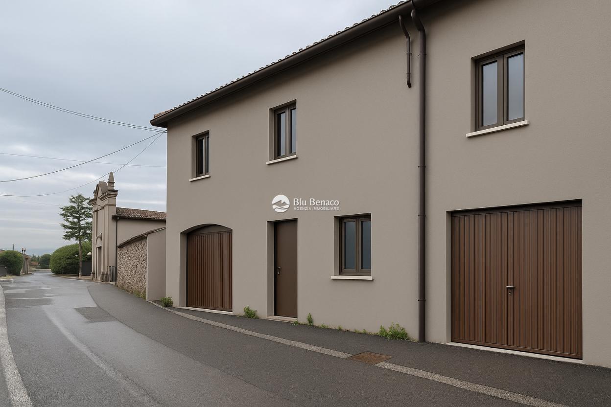Muscoline, villetta a schiera con box auto e giardino 